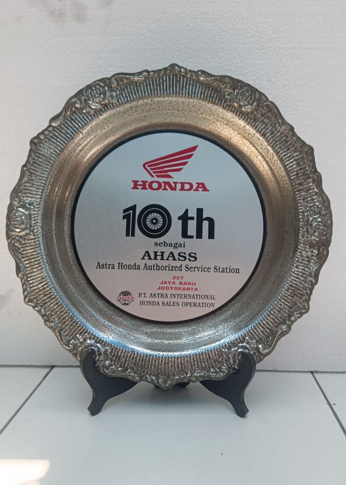 Plakat Honda 10 tahun sebagai AHASS, Jaya Baru Jogyakarta